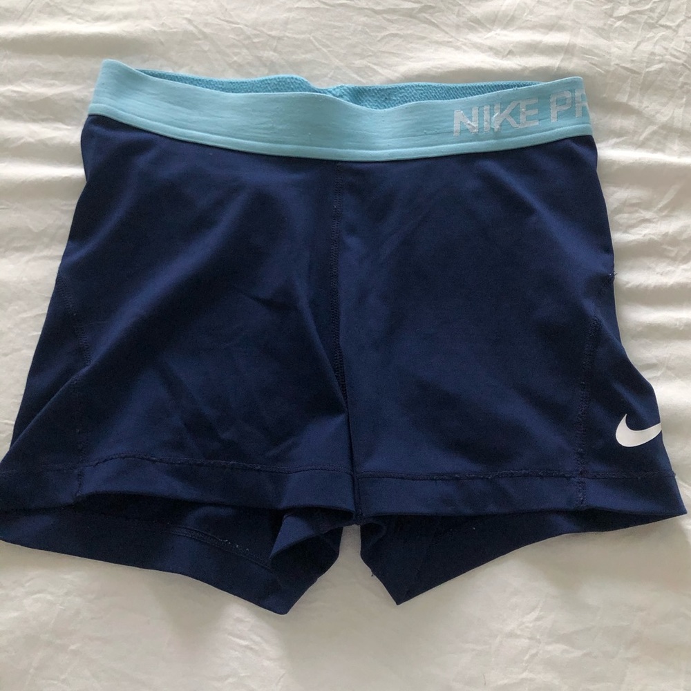blue Nike pros
